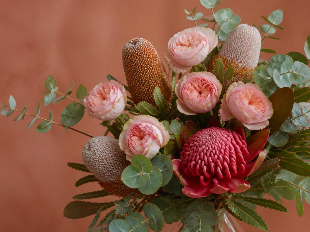 Pinterest — Australian native + rose bouquets — arrangement style reference